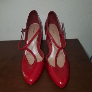Red t-strap pumps